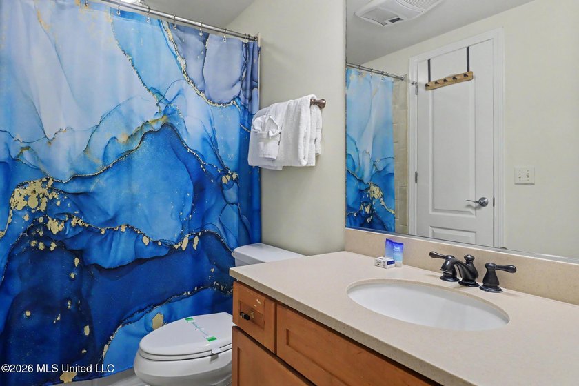 Experience luxury coastal living in this beautifully updated - photo 20