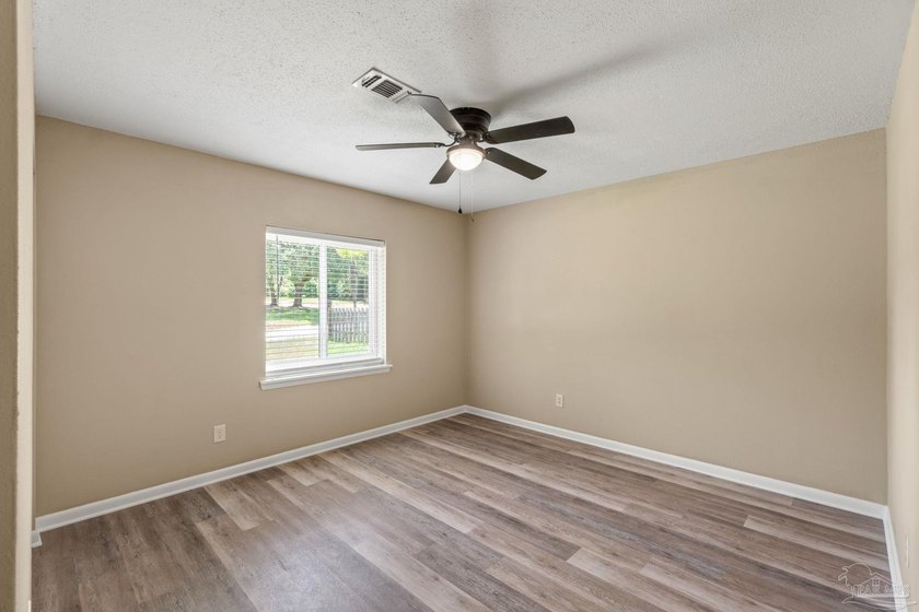 Completely remodeled and move-in ready, this spacious 5-bedroom - photo 22