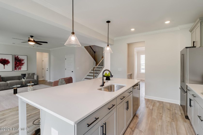 The Nottely is a two-story home with five bedrooms and three and - photo 6
