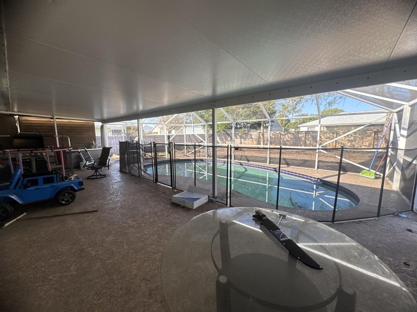 Investment opportunity awaits! This charming 3-bedroom pool home - photo 3