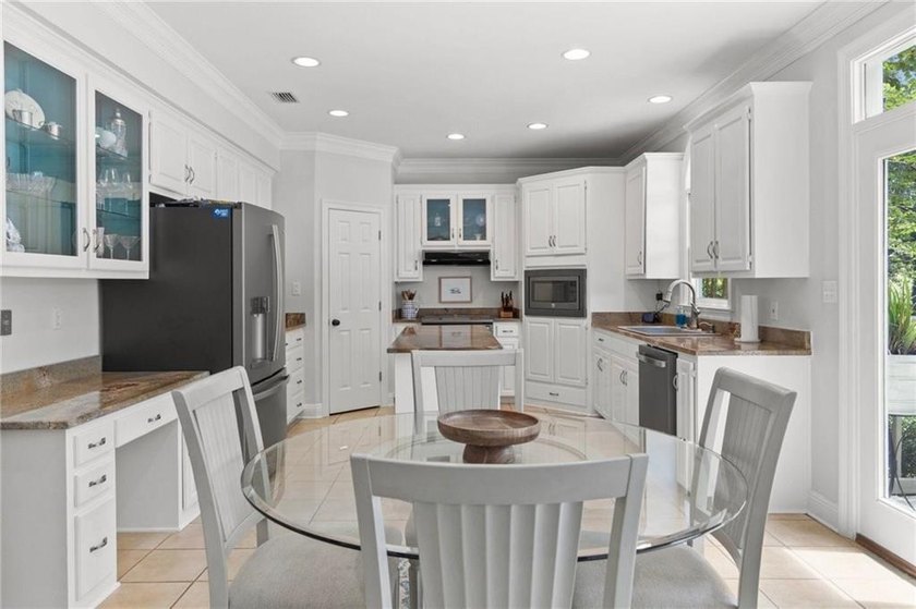 Beautifully maintained and situated on Rock Creek Golf Course - photo 11