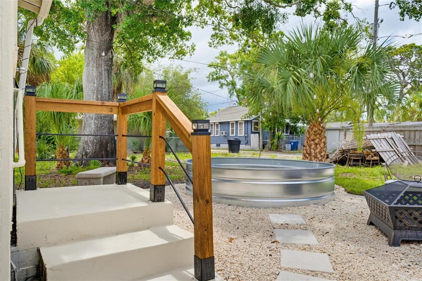 Welcome to this beautifully restored 1920s Craftsman bungalow in - photo 22