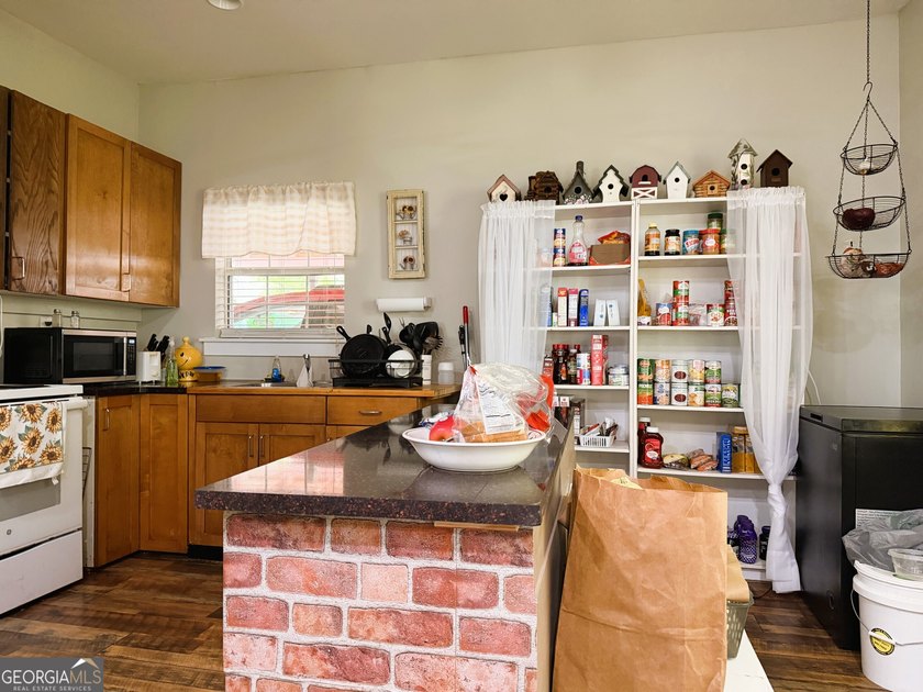 CHARMING TWO-BEDROOM EFFICIENCY COTTAGE TUCKED AWAY ON OVER A - photo 7