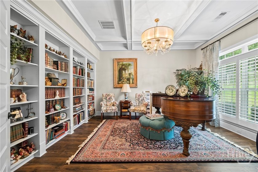 Thoughtfully designed around the ease of main-level living, this - photo 9
