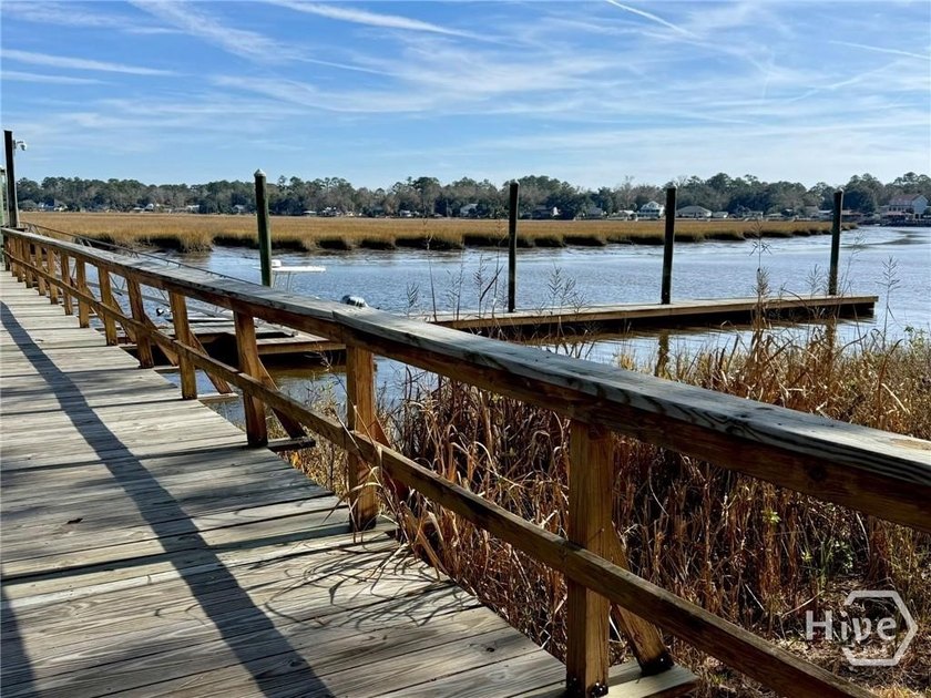 Welcome home to Dolphin Island, a gated island community in - photo 4