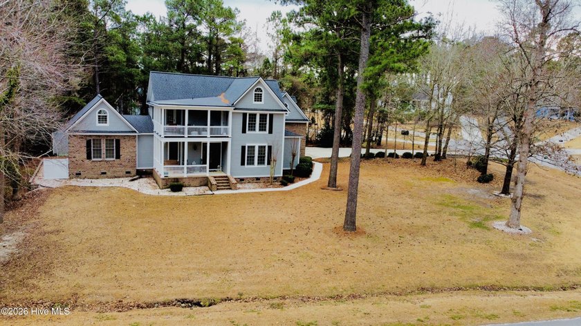 Beautiful custom-built home on corner lot with over 1 Acre of - photo 2