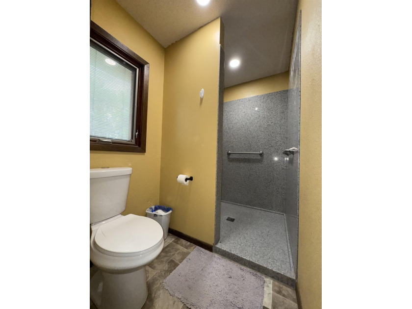 Welcome to 909 Crescent Drive in Ness City, where space, comfort - photo 30