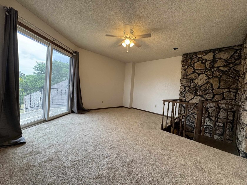 Welcome to 909 Crescent Drive in Ness City, where space, comfort - photo 45