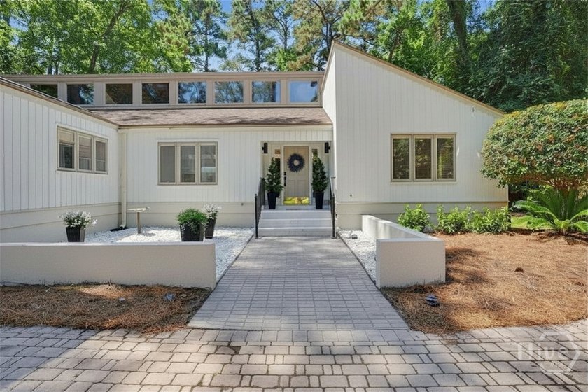 Beautifully reimagined and move-in ready, this updated 3-bedroom - photo 2