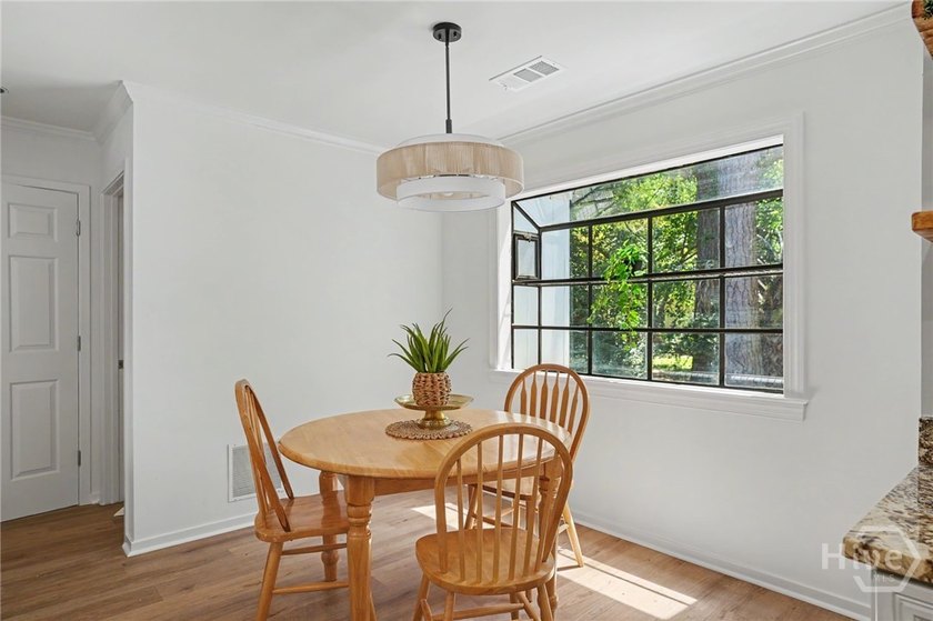 Beautifully reimagined and move-in ready, this updated 3-bedroom - photo 9