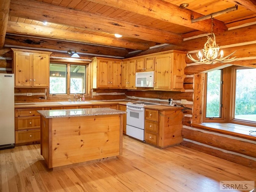 Nestled against the base of the hillside with an expansive view - photo 50
