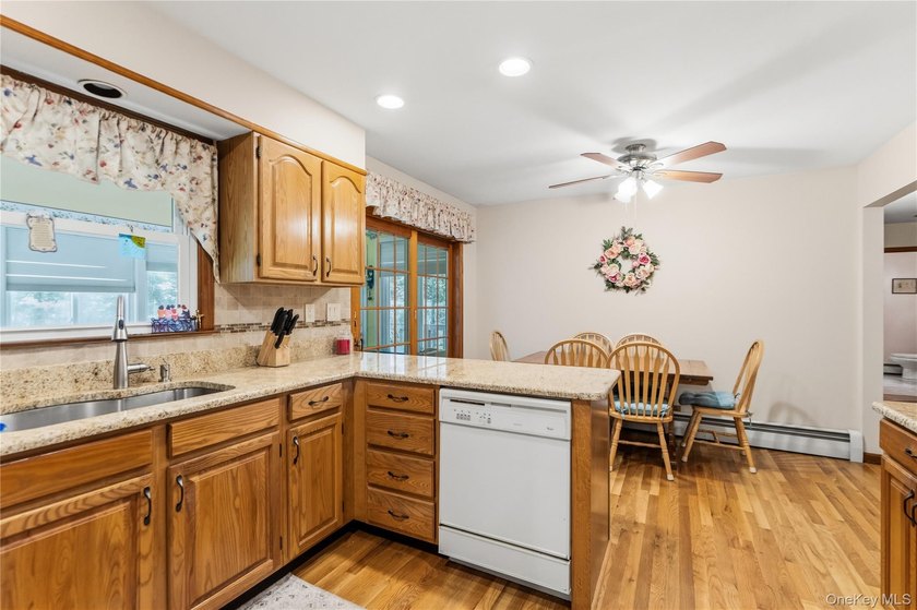 Nestled on a quiet cul-de-sac in one of East Setauket's most - photo 17