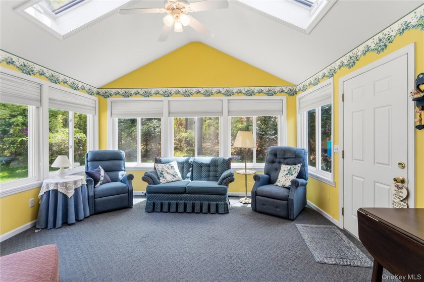 Nestled on a quiet cul-de-sac in one of East Setauket's most - photo 23