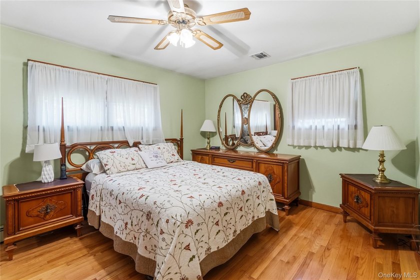 Nestled on a quiet cul-de-sac in one of East Setauket's most - photo 24