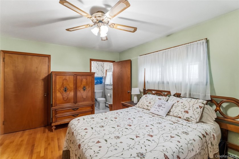 Nestled on a quiet cul-de-sac in one of East Setauket's most - photo 25