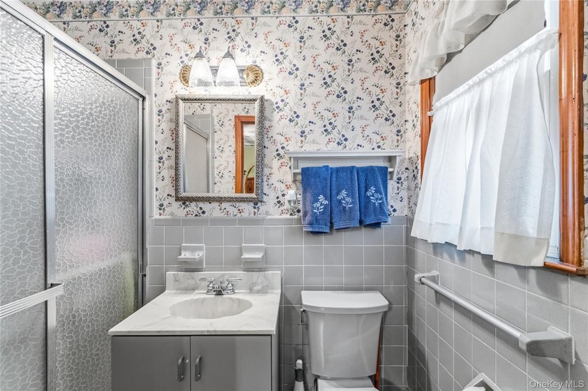 Nestled on a quiet cul-de-sac in one of East Setauket's most - photo 26