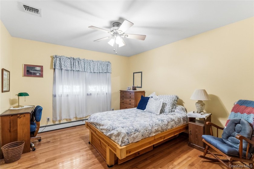 Nestled on a quiet cul-de-sac in one of East Setauket's most - photo 27