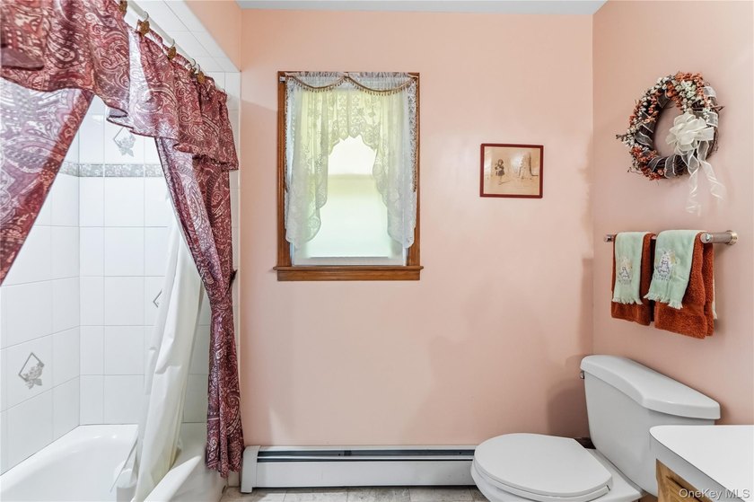 Nestled on a quiet cul-de-sac in one of East Setauket's most - photo 30