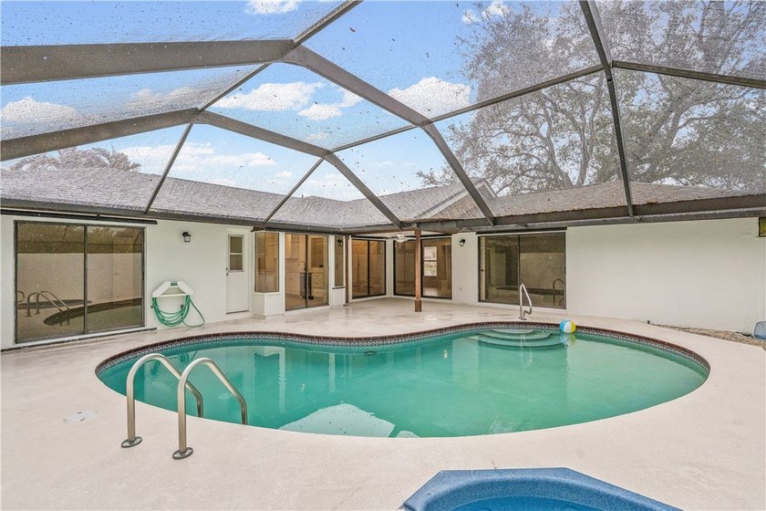 Sophistication meets the shoreline in this renovated modern pool - photo 25