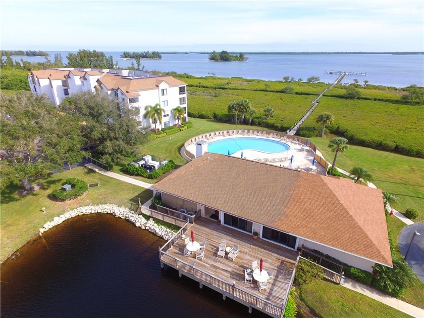 Sophistication meets the shoreline in this renovated modern pool - photo 29