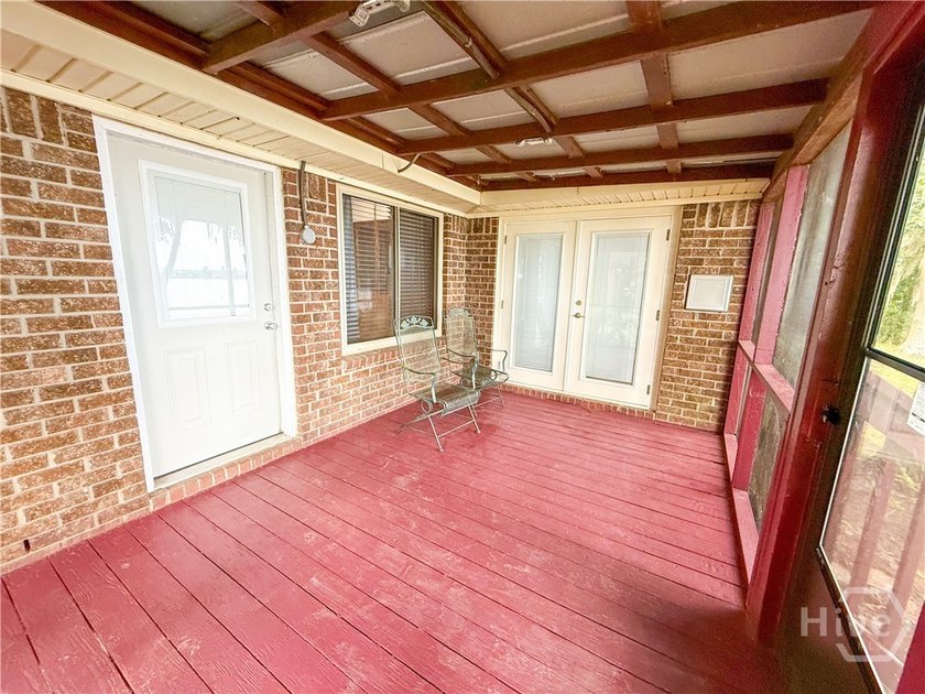 Well-built and well-maintained, this 4-bedroom, 2-bath lakefront - photo 7