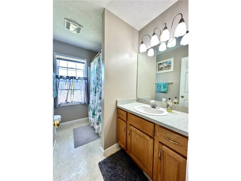 Welcome home to this beautifully maintained and thoughtfully - photo 11