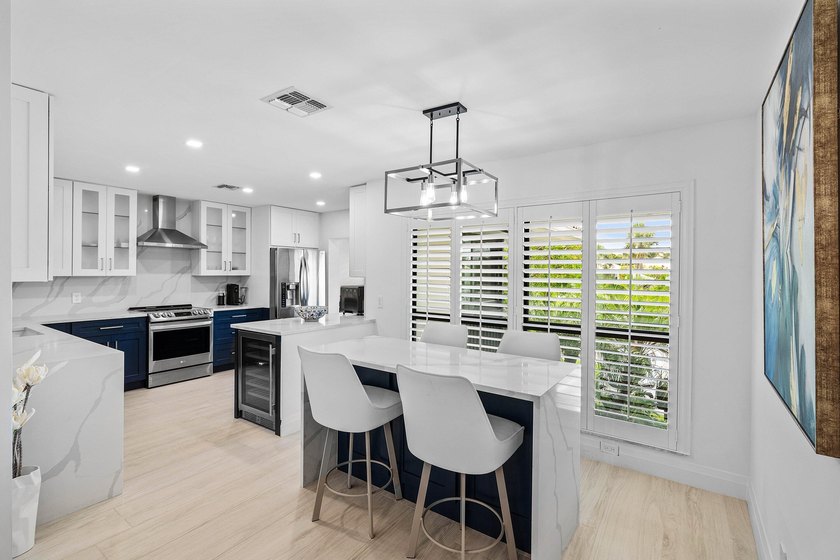 Enjoy tranquil lake views from this beautifully renovated &amp; - photo 13