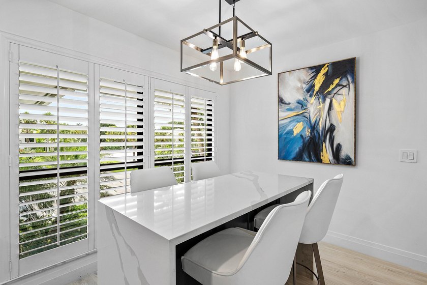 Enjoy tranquil lake views from this beautifully renovated &amp; - photo 14