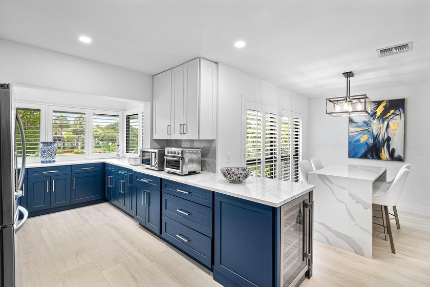 Enjoy tranquil lake views from this beautifully renovated &amp; - photo 16
