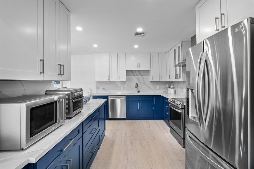 Enjoy tranquil lake views from this beautifully renovated &amp; - photo 18