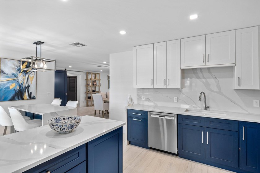 Enjoy tranquil lake views from this beautifully renovated &amp; - photo 19