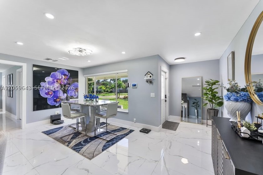Completely renovated and move-in ready! This stunning 3-bedroom - photo 8