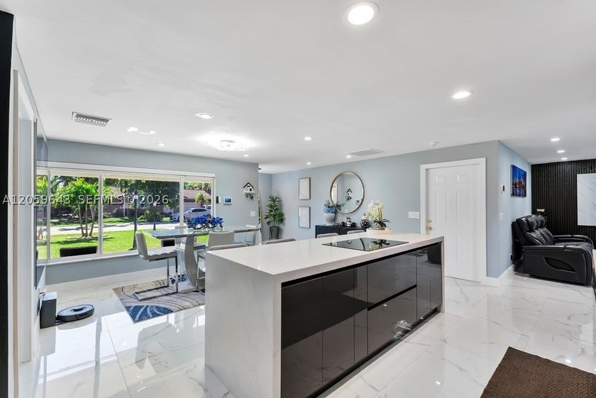Completely renovated and move-in ready! This stunning 3-bedroom - photo 10