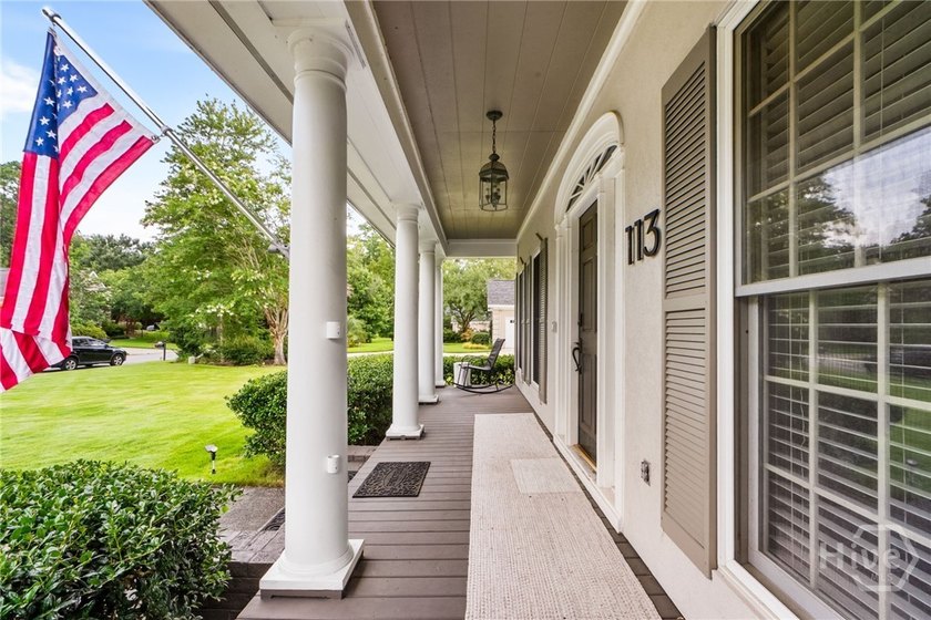 Some homes tell you everything from the curb. This one prefers - photo 4