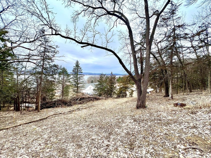 Private and wooded 7.1 acres on the outskirts of the charming - photo 19