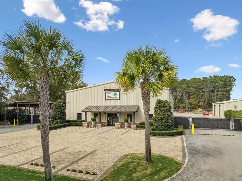 Situated on +/- 2.82 acres, this impressive commercial property - photo 3
