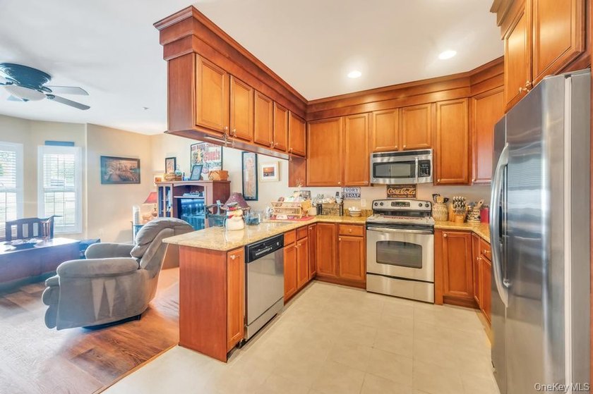 Welcome to maintenance-free living at 305 Okeefe Court in - photo 12