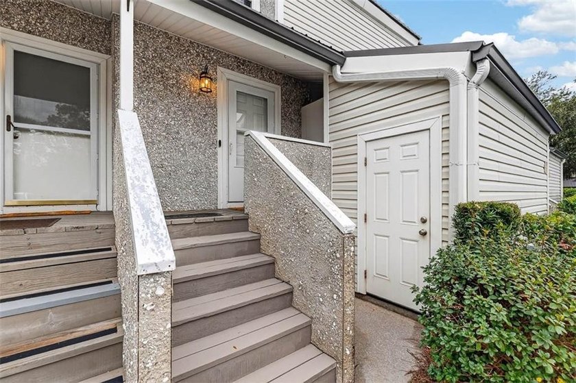 This adorable furnished condo has been remodeled and is in - photo 4