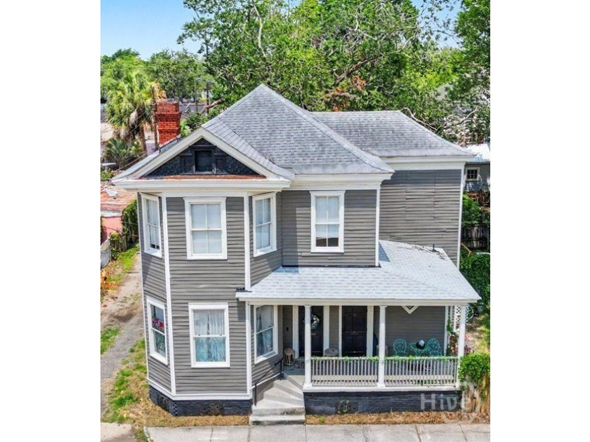 This Wonderfully Updated Duplex is being offered for sale - photo 4