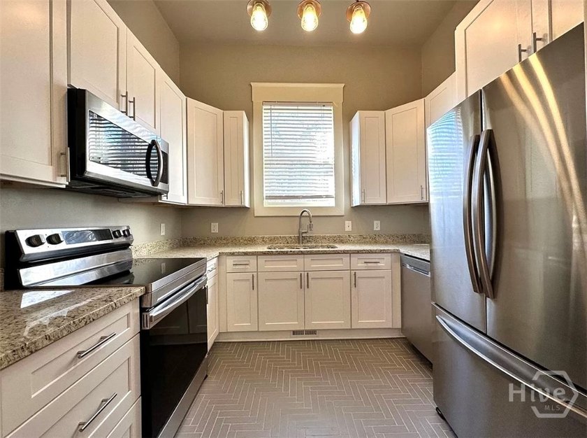 This Wonderfully Updated Duplex is being offered for sale - photo 8