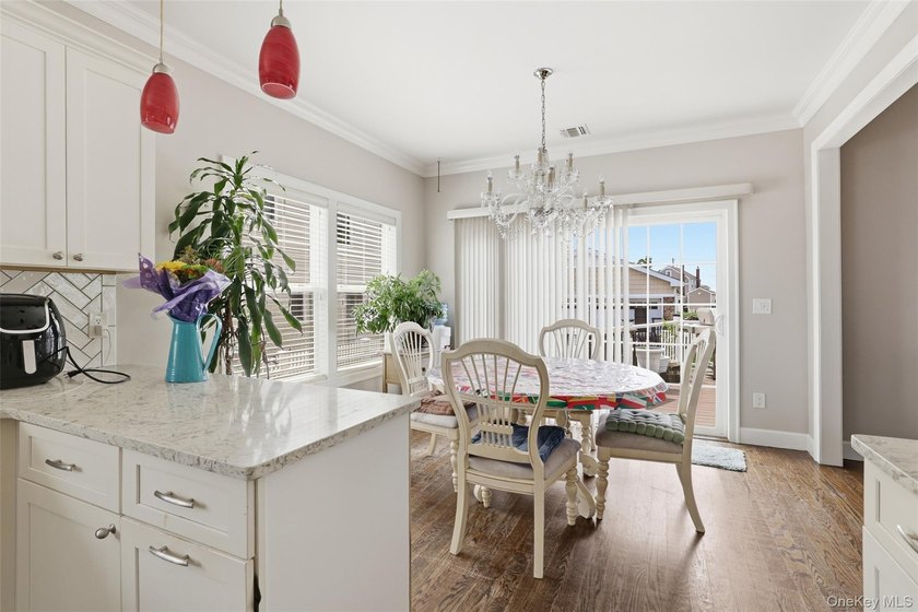 Welcome to 34 Meadow Lane in Amityville. This expansive - photo 12
