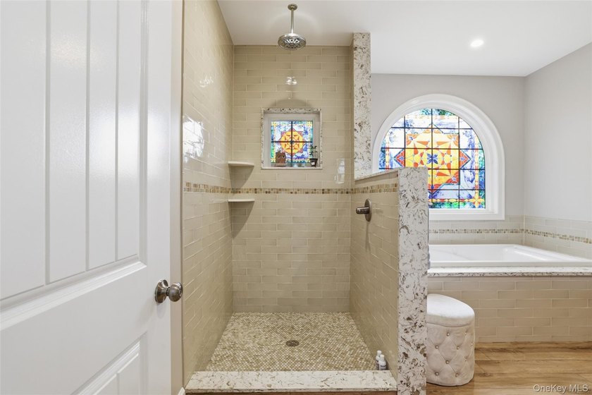 Welcome to 34 Meadow Lane in Amityville. This expansive - photo 17