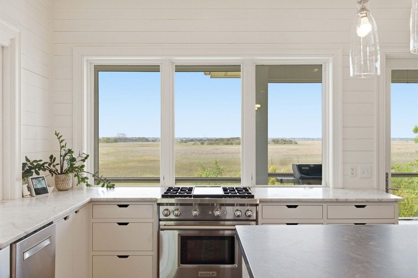 2302 Raven Drive is an exceptional coastal retreat located in - photo 18