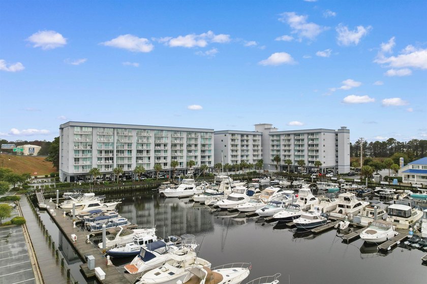 Welcome to waterfront living at its finest in Harbourgate Marina - photo 41