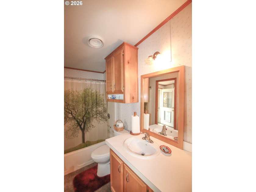 Nestled along the scenic Oregon Coast, this charming 2-bedroom - photo 14