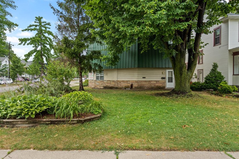 The main level offers 1,365 square feet, providing four offices - photo 2