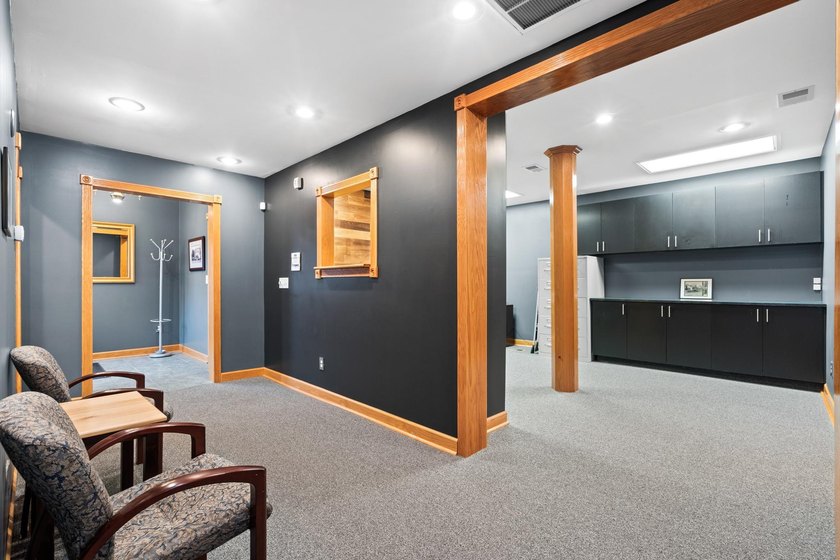 The main level offers 1,365 square feet, providing four offices - photo 5