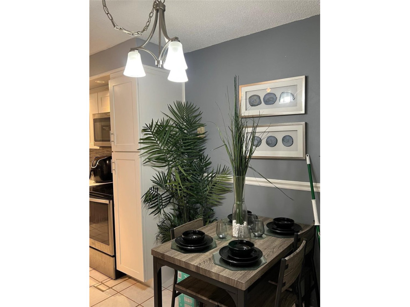 THIS COMFORTABLE 2 BEDROOM 2 BATHROOM HOME HAS A TASTEFULLY - photo 14