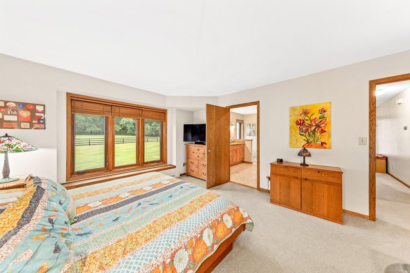 Space, serenity, and sensational design meet at W1818 Lake Rd! - photo 20