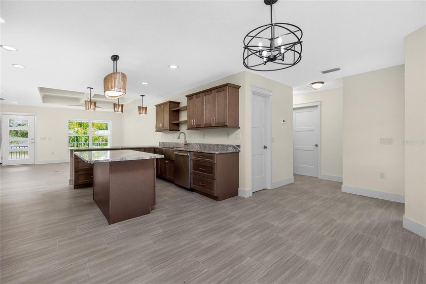 **NEW CONSTRUCTION** Impressive 3 Bedroom, 2 Bathroom home with - photo 22